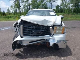 2007 GMC Sierra 2500HD SLT z VIN 1GTHK29607E518459, wystawiony jako IAAI lot #40120837 z przebiegiem 287 407 mil mil oraz . Historia ofert i sprzedaży dostępna na DreamBid. Obrazek 6.