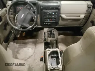 2004 Jeep Wrangler Rubicon z VIN 1J4FA69S44P784141, wystawiony jako Copart lot #55235305 z przebiegiem 125 564 mil mil oraz Szkoda całkowita • Salvage title. Historia ofert i sprzedaży dostępna na DreamBid. Obrazek 8.