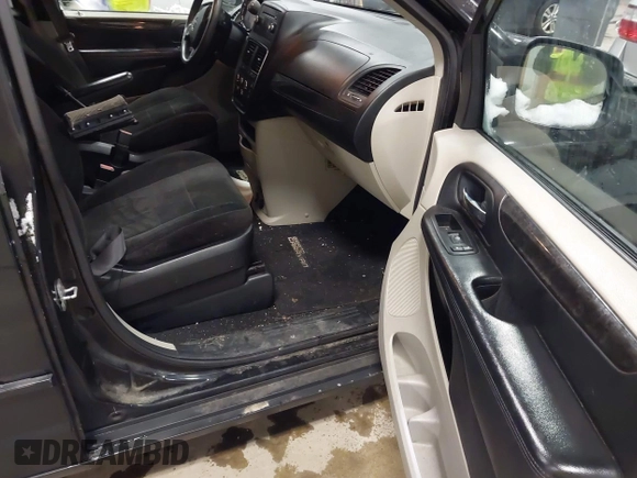 2012 Dodge Grand Caravan SE with VIN 2C4RDGBG8CR155758, listed as a IAAI auction lot 41300951 with 126,209 mi miles and . Bid and sale history available at DreamBid. Image 5.