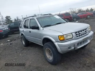 1998 Isuzu Rodeo S with VIN 4S2CM58W6W4375632, listed as a IAAI auction lot 41659797 with 195,732 mi miles and . Bid and sale history available at DreamBid. Image 1.
