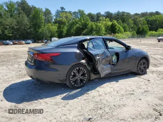 2016 Nissan Maxima SR with VIN 1N4AA6AP1GC428108, listed as a Copart auction lot 57221335 with 90,473 mi miles and Salvage title. Bid and sale history available at DreamBid. Image 3.
