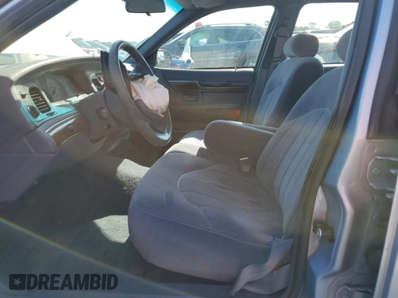1999 Mercury Grand Marquis GS z VIN 2MEFM74W5XX711421, wystawiony jako Copart lot #53062605 z przebiegiem 106 913 mil mil oraz Nie do naprawy • Non repairable. Historia ofert i sprzedaży dostępna na DreamBid. Obrazek 7.