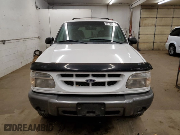 1999 Ford Explorer z VIN 1FMZU24E6XUC14115, wystawiony jako Copart lot #77702694 z przebiegiem 169 783 mil mil oraz Czysty tytuł • Clean title. Historia ofert i sprzedaży dostępna na DreamBid. Obrazek 5.