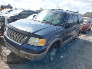 2003 Ford Expedition Eddie Bauer with VIN 1FMRU17W13LA53235, listed as a IAAI auction lot 40669736 with 317,399 mi miles. Bid and sale history available at carsss.com. Image 2.