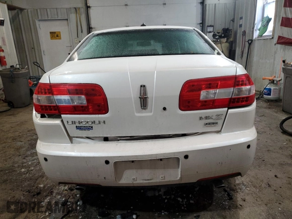 2009 Lincoln MKZ z VIN 3LNHM28T79R629555, wystawiony jako Copart lot #43765295 z przebiegiem 159 033 mil mil oraz Szkoda całkowita • Salvage title. Historia ofert i sprzedaży dostępna na DreamBid. Obrazek 6.