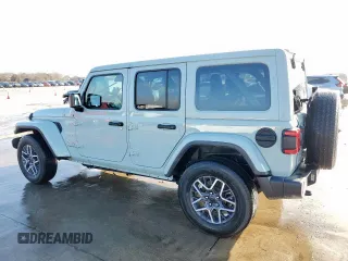 2024 Jeep Wrangler Sahara with VIN 1C4PJXEN6RW110988, listed as a Copart auction lot 46257325 with 39,889 mi miles and Clean title. Bid and sale history available at DreamBid. Image 2.