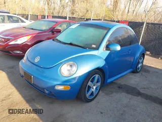2004 Volkswagen New Beetle Coupe Satellite Blue with VIN 3VWGK31C84M420043, listed as a IAAI auction lot 41871049 with 251,646 mi miles. Bid and sale history available at carsss.com. Image 2.