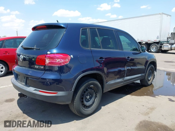 2013 Volkswagen Tiguan with VIN WVGCV3AX6DW605876, listed as a IAAI auction lot 42431619 with 106,279 mi miles and . Bid and sale history available at DreamBid. Image 4.