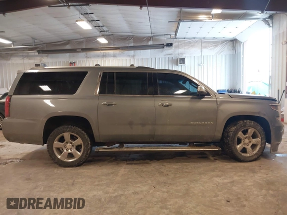 2019 Chevrolet Suburban Premier with VIN 1GNSKJKC1KR291629, listed as a IAAI auction lot 41565675 with 129,672 mi miles and . Bid and sale history available at DreamBid. Image 13.