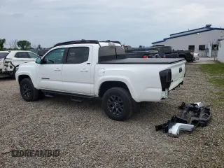 2023 Toyota Tacoma SR with VIN 3TMCZ5AN2PM642205, listed as a Copart auction lot 61045955 with 10,596 mi miles and Salvage title. Bid and sale history available at DreamBid. Image 2.