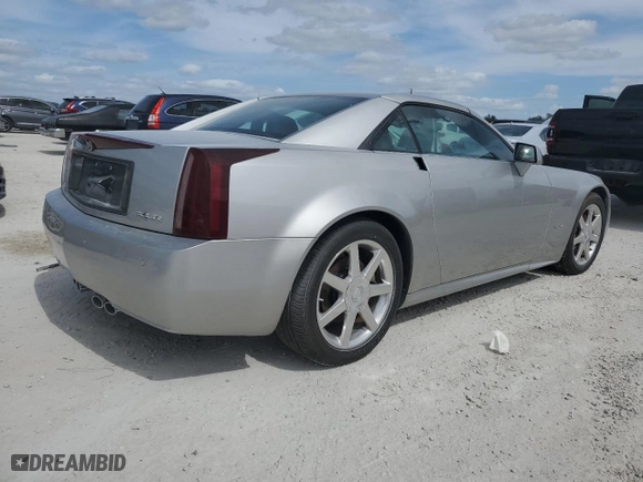 2004 Cadillac XLR with VIN 1G6YV34A945601007, listed as a Copart auction lot 77077394 with NaN miles and Salvage Title. Bid and sale history available at carsss.com. Image 3.