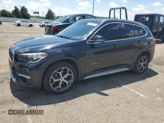 2018 BMW X1 xDrive28i with VIN WBXHT3C30J5K30663, listed as a Copart auction lot 63450175 with 133,260 mi miles and Clean title. Bid and sale history available at DreamBid. Image 1.