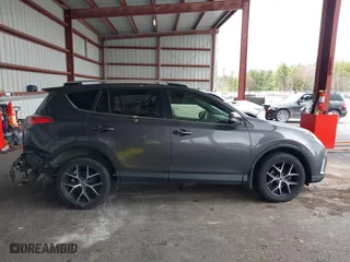 2016 Toyota RAV4 SE with VIN JTMJFREV7GJ072488, listed as a IAAI auction lot 42031254 with 106,901 mi miles. Bid and sale history available at carsss.com. Image 13.