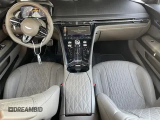 2024 Aston Martin DB12 z VIN SCFRMFFW3RGL12944, wystawiony jako Copart lot #61053374 z przebiegiem 472 mil mil oraz Szkody całkowita. Historia ofert i sprzedaży dostępna na DreamBid. Obrazek 8.