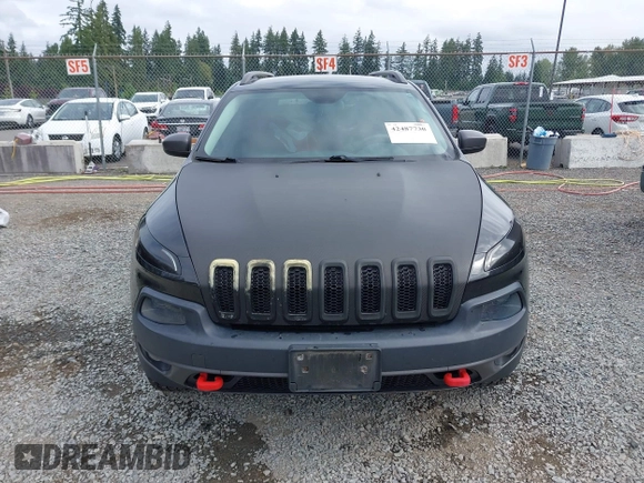 2014 Jeep Cherokee Trailhawk z VIN 1C4PJMBB1EW145683, wystawiony jako IAAI lot #42487730 z przebiegiem 148 277 mil mil oraz . Historia ofert i sprzedaży dostępna na DreamBid. Obrazek 13.