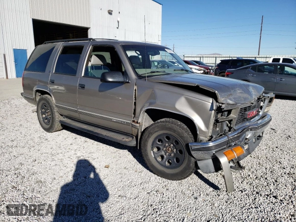1998 GMC Yukon with VIN 1GKEK13R1WR508227, listed as a Copart auction lot 88325315 with 238,085 mi miles and Salvage Title. Bid and sale history available at carsss.com. Image 4.