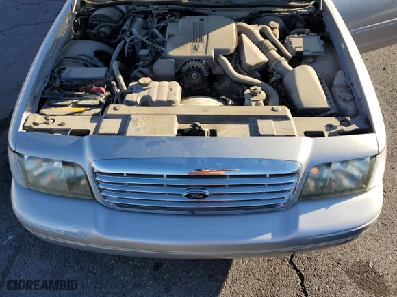 2005 Ford Crown Victoria LX with VIN 2FAFP74W75X165930, listed as a Copart auction lot 81641294 with 138,521 mi miles and Clean Title. Bid and sale history available at carsss.com. Image 11.