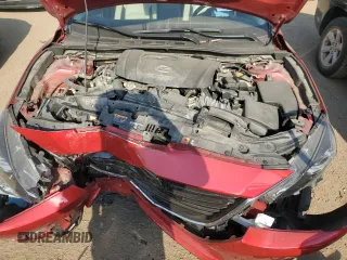 2016 Mazda 3 S Grand Touring z VIN JM1BM1N36G1342594, wystawiony jako Copart lot #57041185 z przebiegiem Nie podano mil oraz Szkoda całkowita • Salvage title. Historia ofert i sprzedaży dostępna na DreamBid. Obrazek 11.