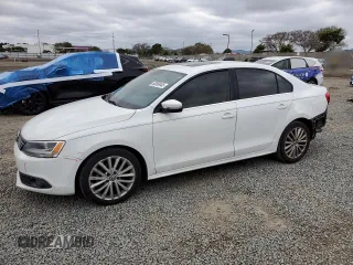2014 Volkswagen Jetta TDI w/Premium/Nav с VIN 3VWLL7AJ0EM332476, выставлен на аукционе Copart как лот 50069445 с пробегом 153 974 миль миль и Списание • Salvage title. История ставок и продаж доступна на DreamBid. Изображение 1.