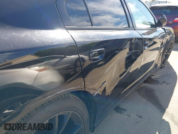 2016 Dodge Charger SXT with VIN 2C3CDXHG6GH146764, listed as a IAAI auction lot 42020618 with 154,693 mi miles and . Bid and sale history available at carsss.com. Image 19.