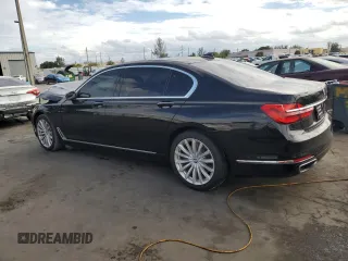 2018 BMW 7 Series 740i with VIN WBA7E2C59JB216290, listed as a Copart auction lot 89082215 with 56,020 mi miles and Salvage Title. Bid and sale history available at carsss.com. Image 2.