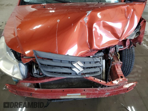 2013 Suzuki SX4 Crossover z VIN JS2YB5A3XD6101784, wystawiony jako Copart lot #45408295 z przebiegiem Nie podano mil oraz Szkoda całkowita • Salvage title. Historia ofert i sprzedaży dostępna na DreamBid. Obrazek 12.