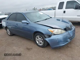 2004 Toyota Camry LE with VIN 4T1BF32K54U572537, listed as a IAAI auction lot 41850322 with 167,076 mi miles and . Bid and sale history available at DreamBid. Image 1.