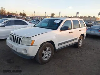 2006 Jeep Grand Cherokee Laredo with VIN 1J8GS48K16C348315, listed as a IAAI auction lot 41062772 with 239,662 mi miles. Bid and sale history available at carsss.com. Image 16.