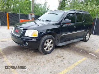 2005 GMC Envoy XL SLE with VIN 1GKET16S156114805, listed as a IAAI auction lot 42163519 with 168,584 mi miles. Bid and sale history available at carsss.com. Image 2.