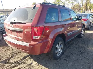 2008 Jeep Grand Cherokee Laredo with VIN 1J8GR48K28C164998, listed as a IAAI auction lot 41844702 with 999,999 mi miles. Bid and sale history available at carsss.com. Image 4.