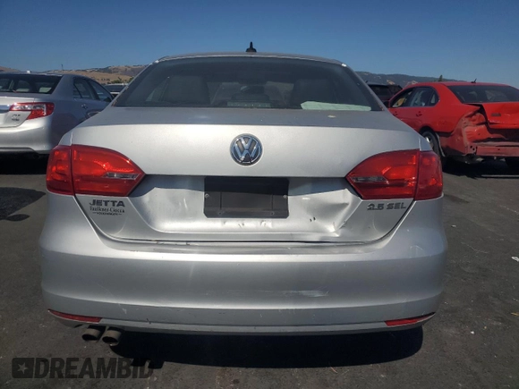 2012 Volkswagen Jetta SEL with VIN 3VWLP7AJ6CM324271, listed as a Copart auction lot 59986855 with 129,002 mi miles and Salvage title. Bid and sale history available at DreamBid. Image 6.