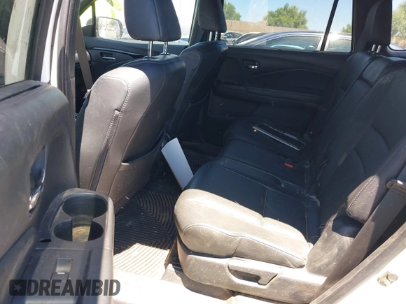 2019 Honda Passport Elite z VIN 5FNYF8H05KB009575, wystawiony jako IAAI lot #42804678 z przebiegiem 70 468 mil mil oraz . Historia ofert i sprzedaży dostępna na DreamBid. Obrazek 8.