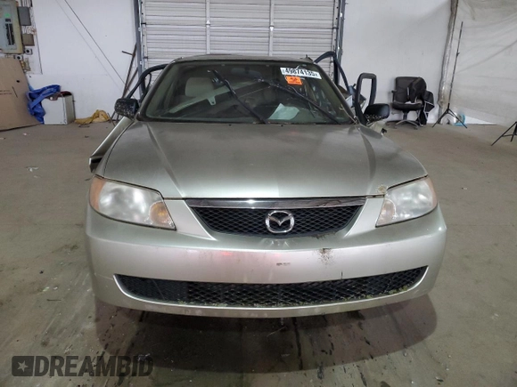 2002 Mazda Protege DX with VIN JM1BJ225021583998, listed as a Copart auction lot 49874135 with Not Provided miles and Non Repairable. Bid and sale history available at DreamBid. Image 5.
