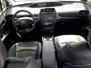 2020 Toyota Prius L Eco z VIN JTDKARFU9L3105675, wystawiony jako Copart lot #54587165 z przebiegiem 130 560 mil mil oraz Szkoda całkowita • Salvage title. Historia ofert i sprzedaży dostępna na DreamBid. Obrazek 8.