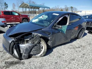 2023 Tesla Model Y Long Range z VIN 7SAYGDEE8PF669268, wystawiony jako Copart lot #45575215 z przebiegiem Nie podano mil oraz Szkoda całkowita • Salvage title. Historia ofert i sprzedaży dostępna na DreamBid. Obrazek 1.