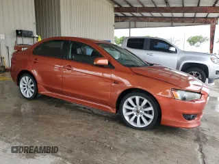2010 Mitsubishi Lancer GTS with VIN JA32U8FW3AU022400, listed as a Copart auction lot 72569714 with 147,440 mi miles and Salvage Title. Bid and sale history available at carsss.com. Image 4.