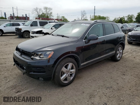 2012 Volkswagen Touareg Sport with VIN WVGFF9BP8CD001039, listed as a Copart auction lot 57764125 with 128,540 mi miles and Clean title. Bid and sale history available at DreamBid. Image 1.