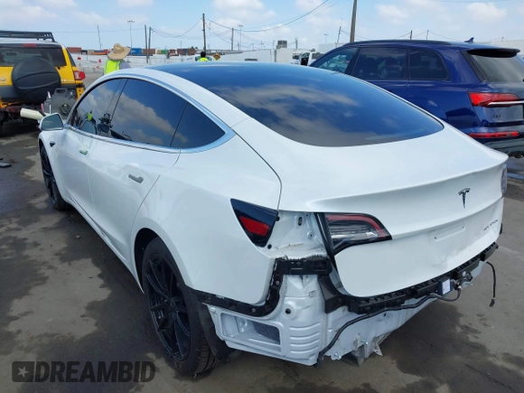 2020 Tesla Model 3 Long Range with VIN 5YJ3E1EB9LF795246, listed as a IAAI auction lot 41895750 with 163,061 mi miles and . Bid and sale history available at DreamBid. Image 3.