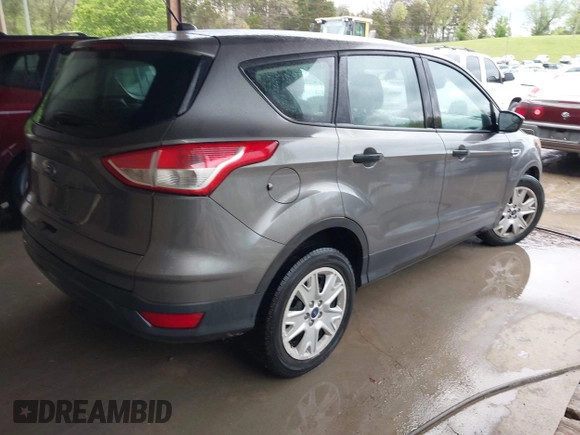 2014 Ford Escape S with VIN 1FMCU0F71EUC16148, listed as a IAAI auction lot 42025551 with 105,274 mi miles. Bid and sale history available at carsss.com. Image 4.