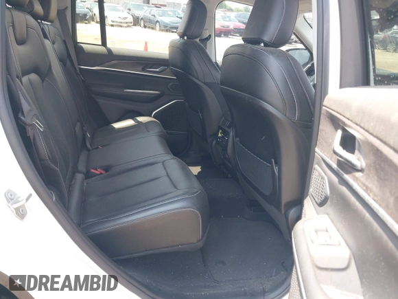 2023 Jeep Grand Cherokee with VIN 1C4RJYB63PC649000, listed as a IAAI auction lot 42306975 with 29,948 mi miles and . Bid and sale history available at DreamBid. Image 8.