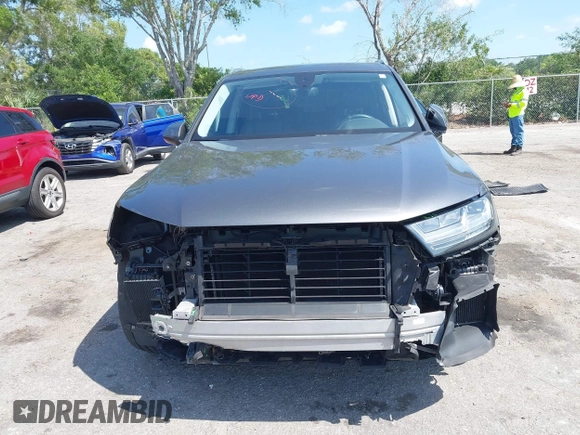 2019 Audi Q7 Premium Plus z VIN WA1LAAF70KD020498, wystawiony jako IAAI lot #41976990 z przebiegiem 91 643 mil mil oraz . Historia ofert i sprzedaży dostępna na DreamBid. Obrazek 12.
