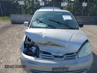 2003 Toyota Prius z VIN JT2BK18U330074266, wystawiony jako IAAI lot #42051919 z przebiegiem 214 567 mil mil oraz . Historia ofert i sprzedaży dostępna na DreamBid. Obrazek 11.