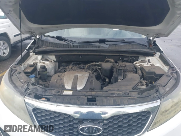 2011 Kia Sorento LX with VIN 5XYKTDA23BG060231, listed as a IAAI auction lot 42142538 with 166,884 mi miles. Bid and sale history available at carsss.com. Image 10.