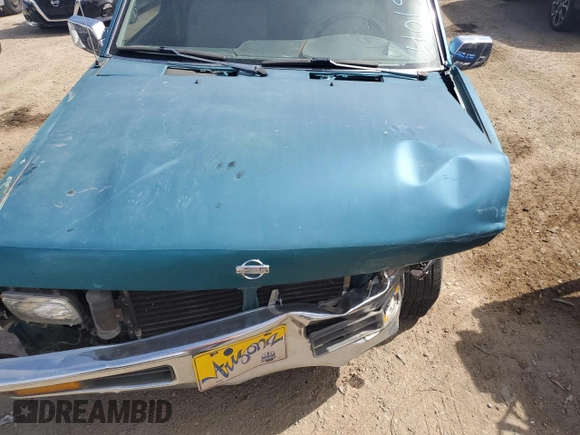 1995 Nissan Frontier XE z VIN 1N6HD16S7SC401954, wystawiony jako Copart lot #52923105 z przebiegiem 98 441 mil mil oraz Szkoda całkowita • Salvage title. Historia ofert i sprzedaży dostępna na DreamBid. Obrazek 12.