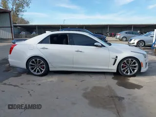 2017 Cadillac CTS-V z VIN 1G6A15S64H0137358, wystawiony jako IAAI lot #41336455 z przebiegiem 76 367 mil mil oraz . Historia ofert i sprzedaży dostępna na DreamBid. Obrazek 13.