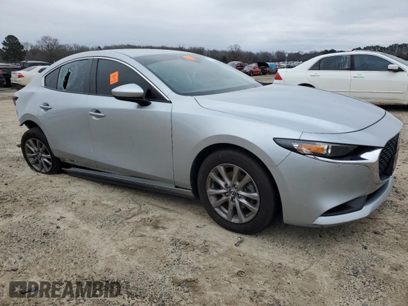 2021 Mazda 3 2.0 with VIN JM1BPAA78M1314033, listed as a Copart auction lot 87725525 with 58,876 mi miles and Salvage Title. Bid and sale history available at DreamBid. Image 4.