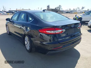 2020 Ford Fusion SE with VIN 3FA6P0HD8LR171120, listed as a IAAI auction lot 42004093 with 35,941 mi miles and . Bid and sale history available at DreamBid. Image 3.