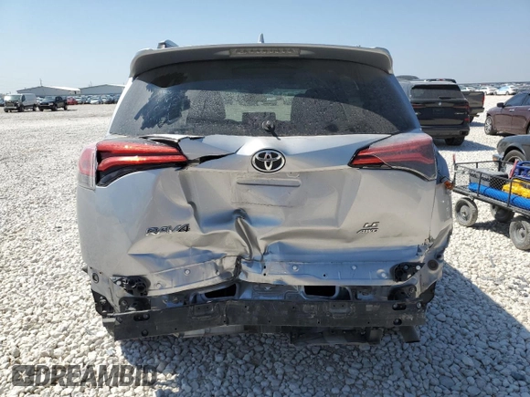 2018 Toyota RAV4 LE with VIN JTMBFREV2JD250267, listed as a Copart auction lot 48792785 with 80,801 mi miles and Salvage Title. Bid and sale history available at carsss.com. Image 6.