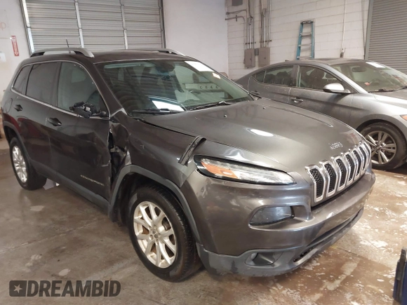 2016 Jeep Cherokee Altitude z VIN 1C4PJLCB0GW338970, wystawiony jako IAAI lot #41559196 z przebiegiem 129 366 mil mil oraz . Historia ofert i sprzedaży dostępna na DreamBid. Obrazek 1.