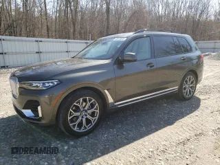 2021 BMW X7 xDrive40i with VIN 5UXCW2C09M9F82802, listed as a Copart auction lot 48970575 with 137,018 mi miles and Clean Title. Bid and sale history available at carsss.com. Image 1.